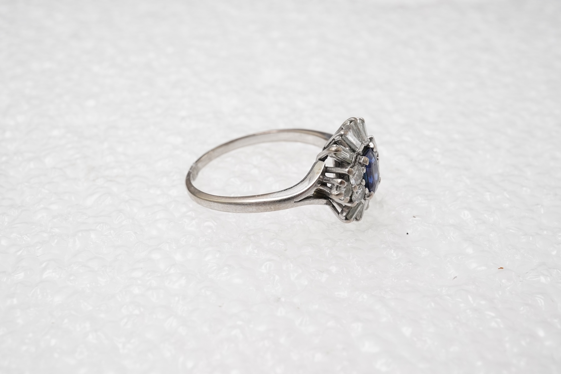 A sapphire and diamond ring, mid 20th century